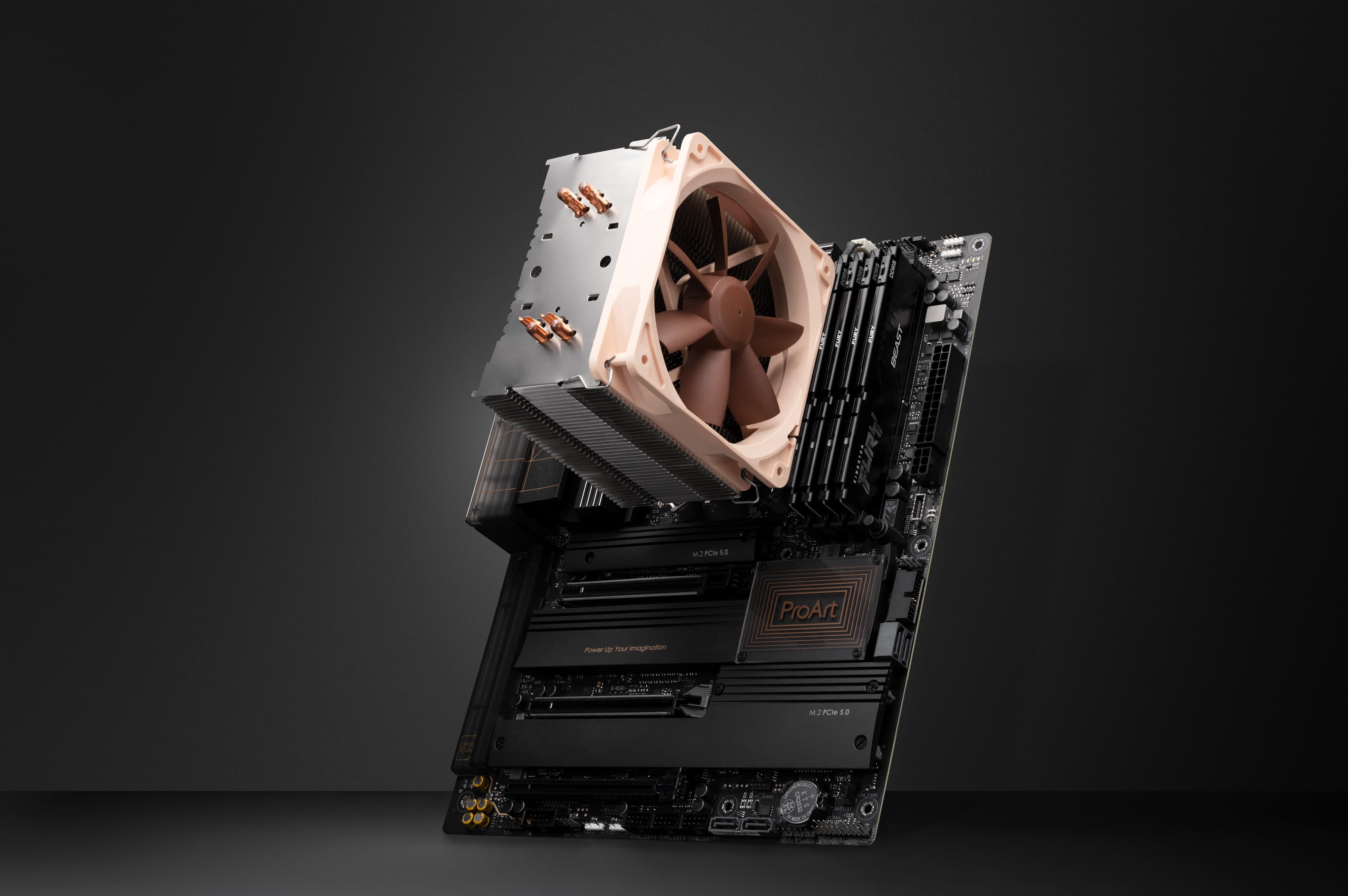 Old Noctua CPU cooler being installed on a modern AM5 motherboard