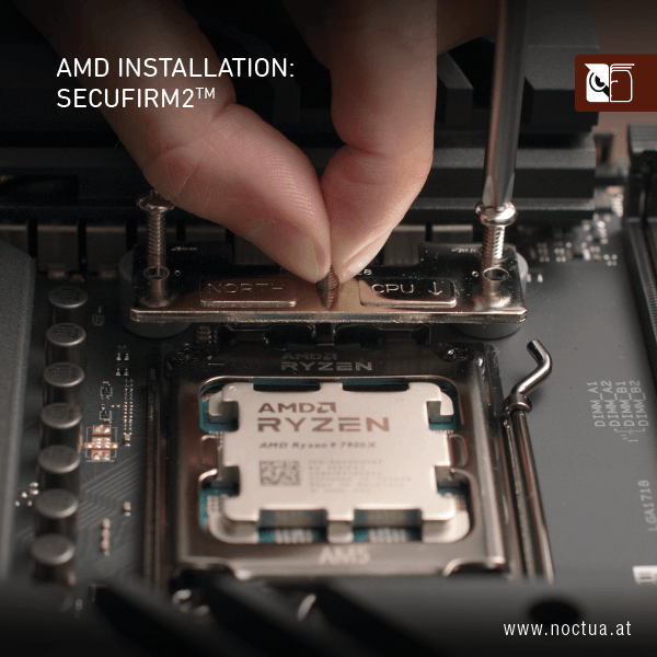 Close-up of a hand installing a mounting bracket on an AMD AM5 motherboard and a screwdriver tightens a screw that goes through the mounting bars at the right.