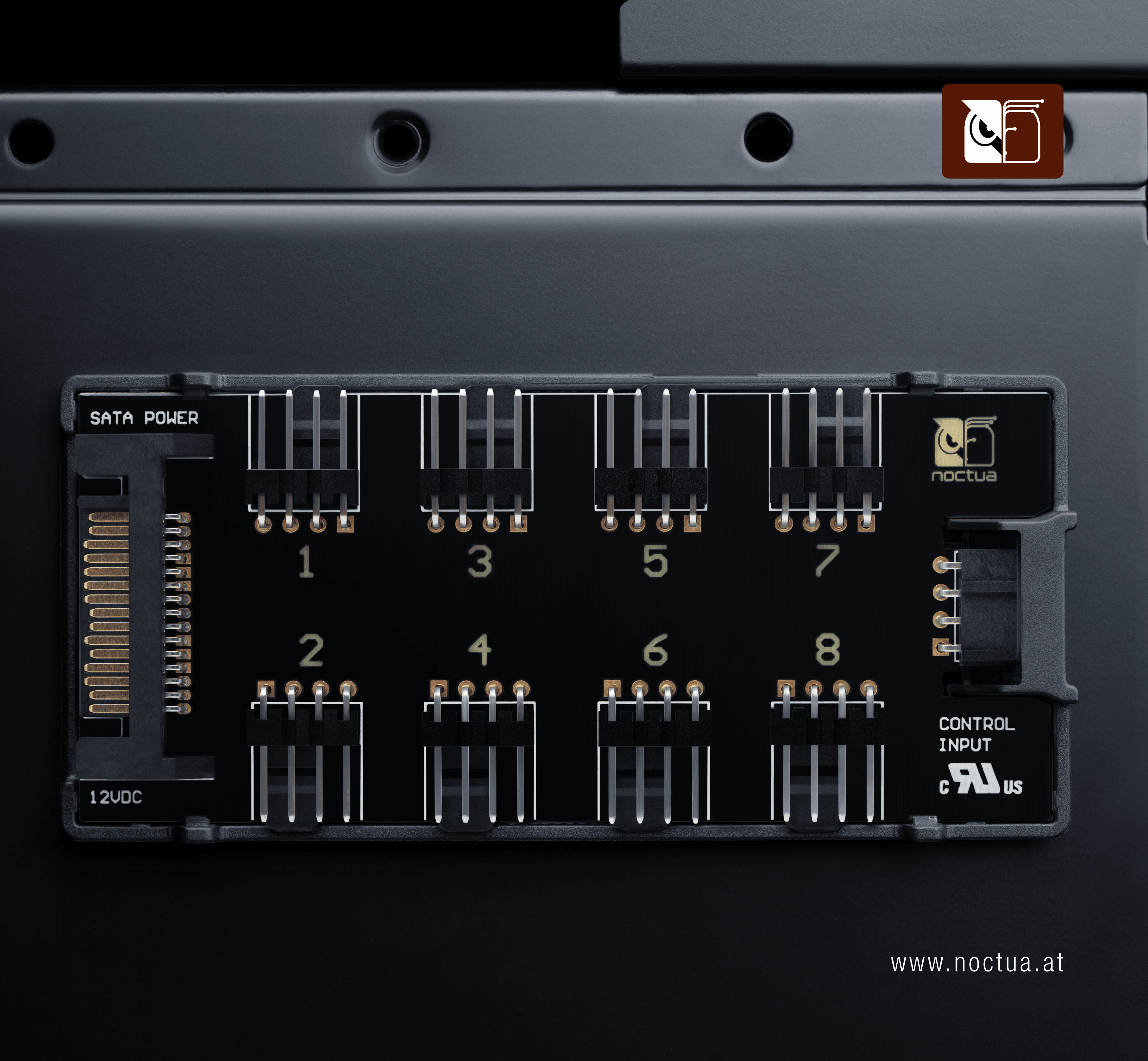 The Noctua NA-FH1 fan hub magnetically attached to the interior of a PC case.