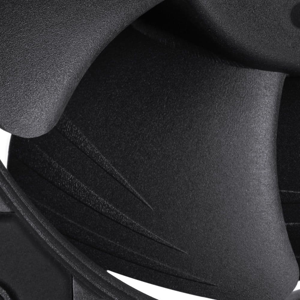 A close-up of a matte black Noctua NF-A8 fan blade, highlighting the textured surface and Flow Acceleration Channels.